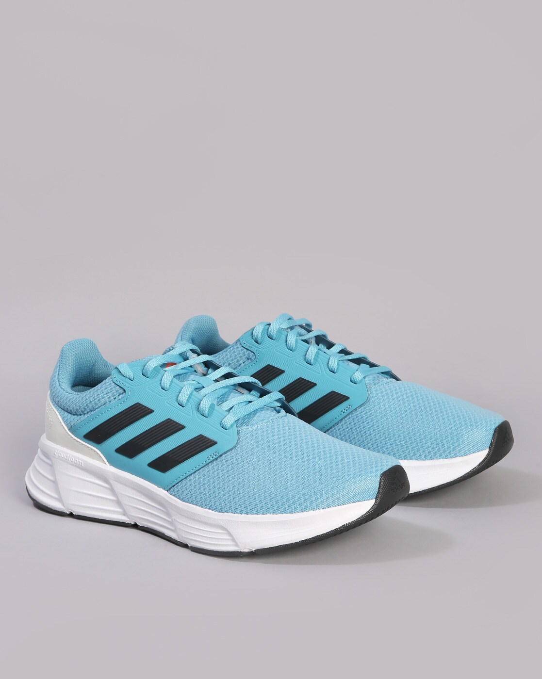 Light blue adidas deals tennis shoes