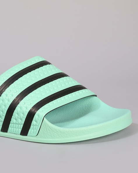 Adidas adilette slides on sale green