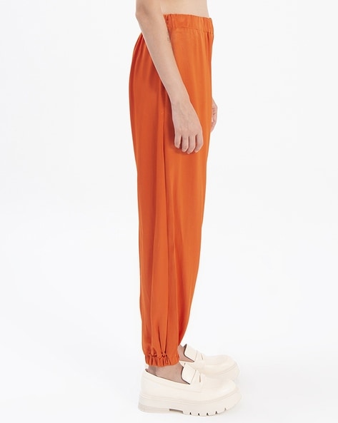 Orange joggers for online women