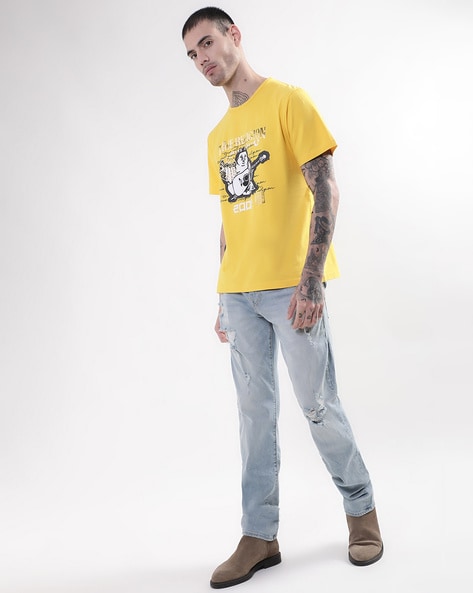 blue and yellow true religion shirt