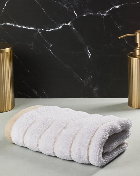 Beige bathroom online towels