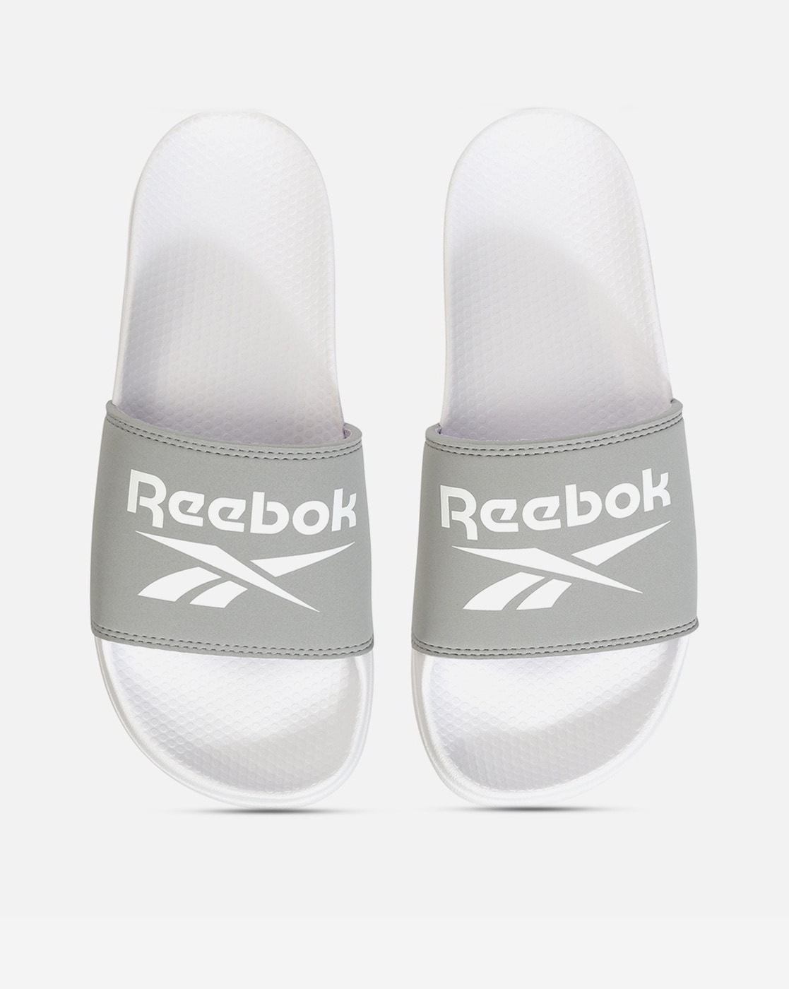 Reebok slides online white