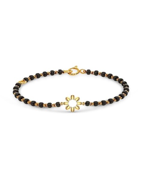 Stylish Black and Carved Gold Bead Bracelet