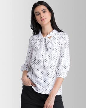 white spotty top