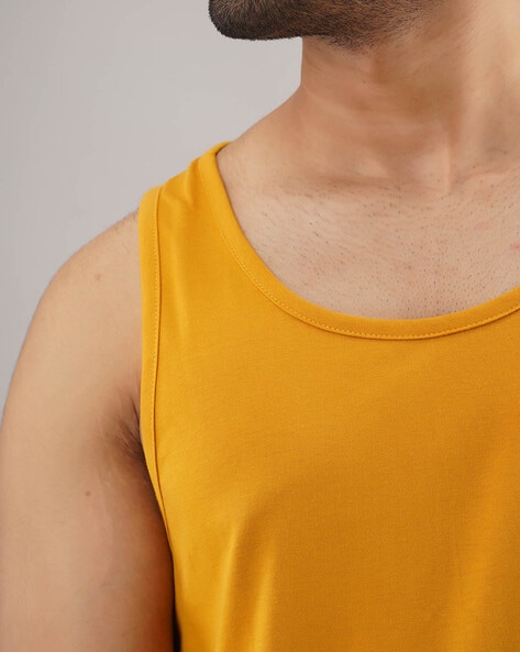 Mustard yellow shop vest top