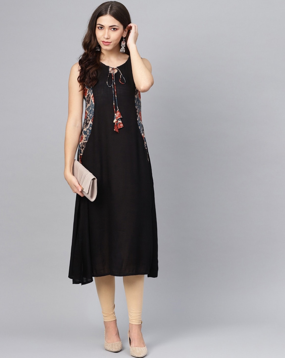 Ladies Sleeveless Round Neck Elegant Designs Red And Black Cotton Kurtis  Bust Size: 38 Centimeter (cm) at Best Price in Mehsana | Meet Ladies Wear
