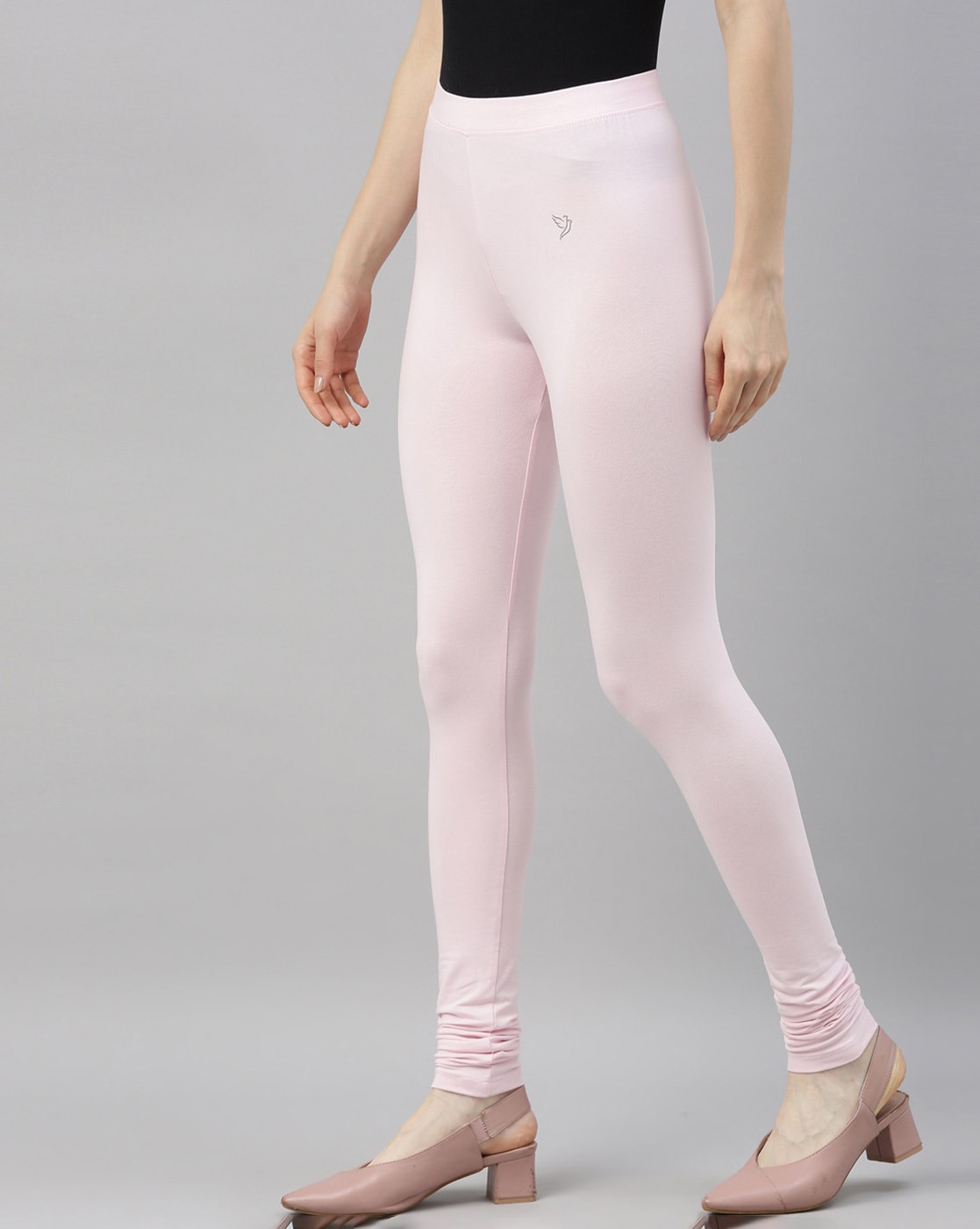 wearing pink skinny fit long sleeves crop top with pink skinny leggings