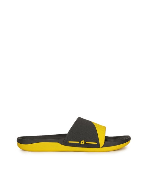 Yellow lacoste sliders hot sale