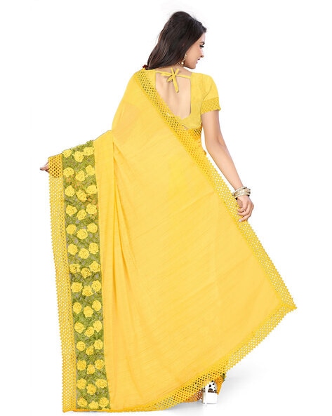 New trend designer yellow color heavy silk saree with blouse.