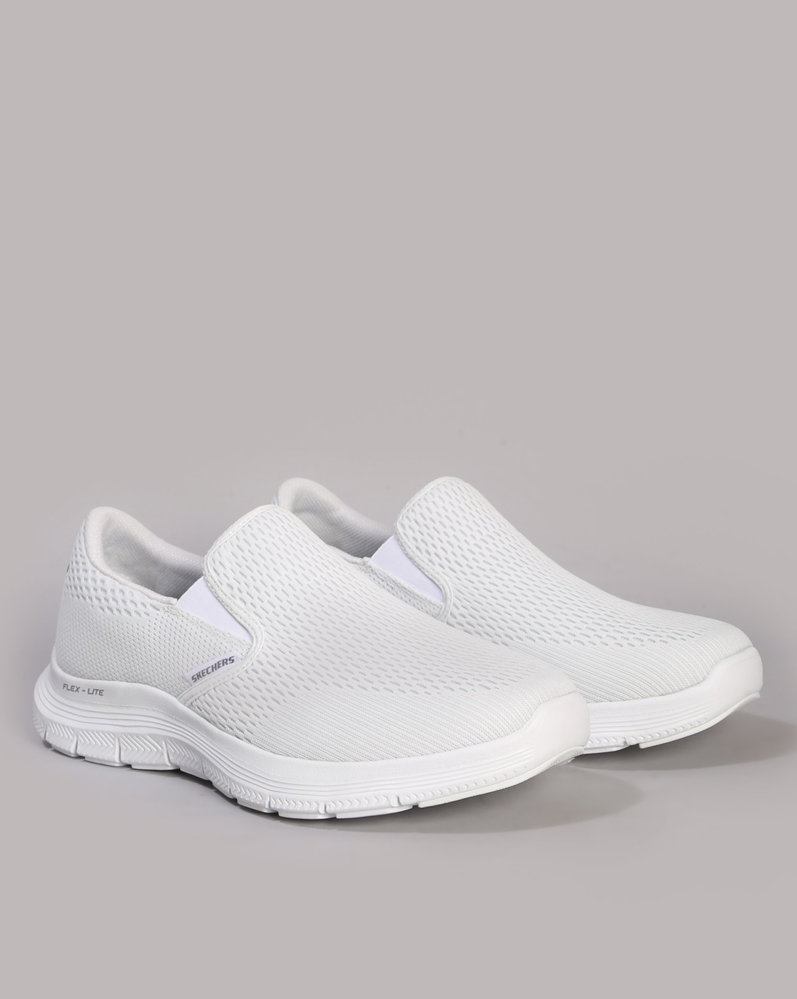 Skechers slip on mens on sale white