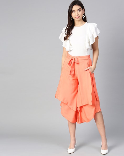 Image 2 of TROUSERS WITH FRILLS from Zara | Sleeves designs for dresses,  Ruffle pants outfit women, Tiered dresses