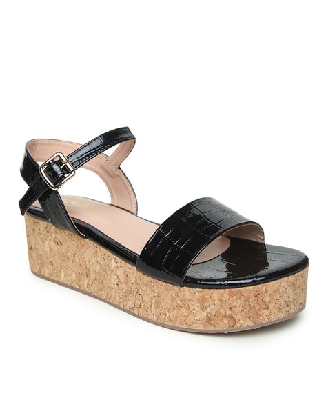 Buy PUMA Women Black Leather Flatform Sandals - Heels for Women 2455033 |  Myntra