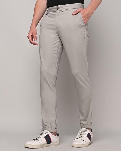 Beige Tapered Fit Solid Trousers United Colors of Benetton  GQ India  GQ  Wardrobe