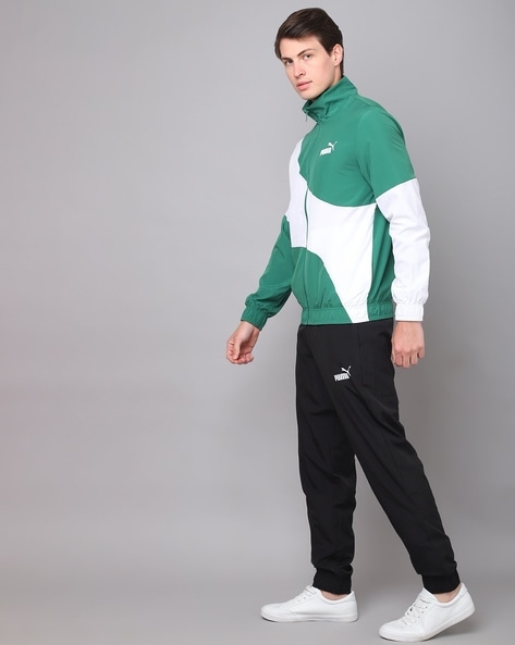 Nike woven tracksuit store set in green