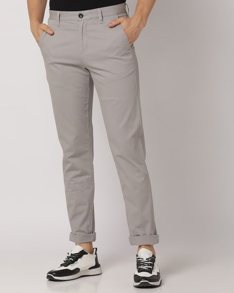 Buy Men Blue Solid Slim Fit Trousers Online - 742004 | Van Heusen