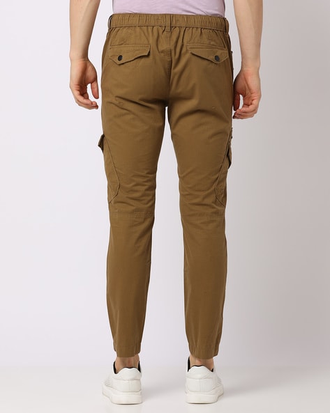 Buy Khaki Trousers Pants for Men by DNMX Online Ajio