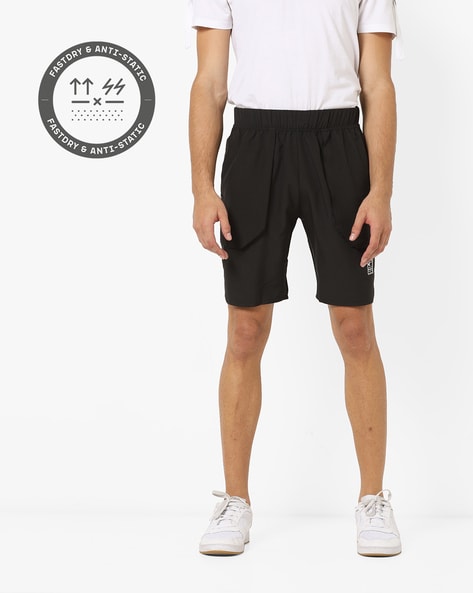 Black tennis shorts with 2025 pockets