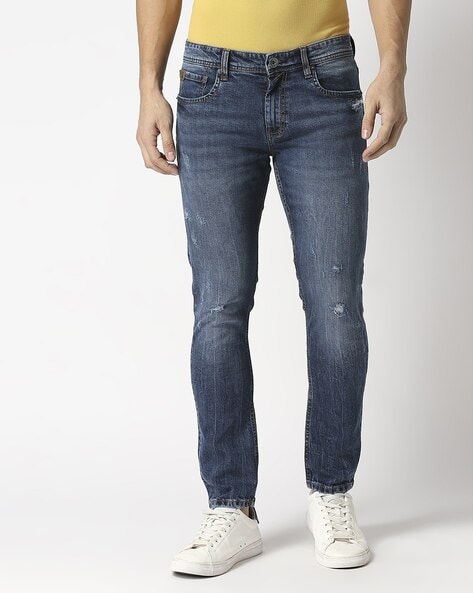 Light-Wash Slim Fit Distressed Jeans
