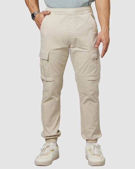 Buy Beige Trousers & Pants for Men by CELIO Online | Ajio.com