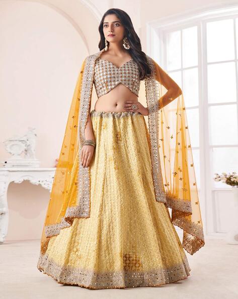 Tuscan Yellow Brocade Lehenga Set With Red Bandhani Dupatta Online - Kalki  Fashion | Brocade lehenga, Banarasi lehenga, Lehenga