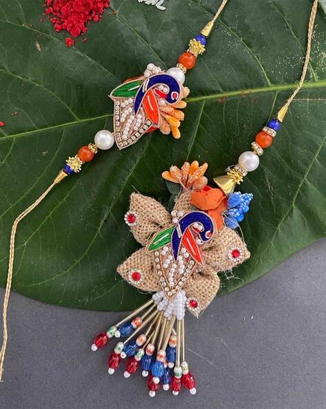 Mahi Combo of Combo of Ganpati Swastik and Peacock Shaped Rakhi's with