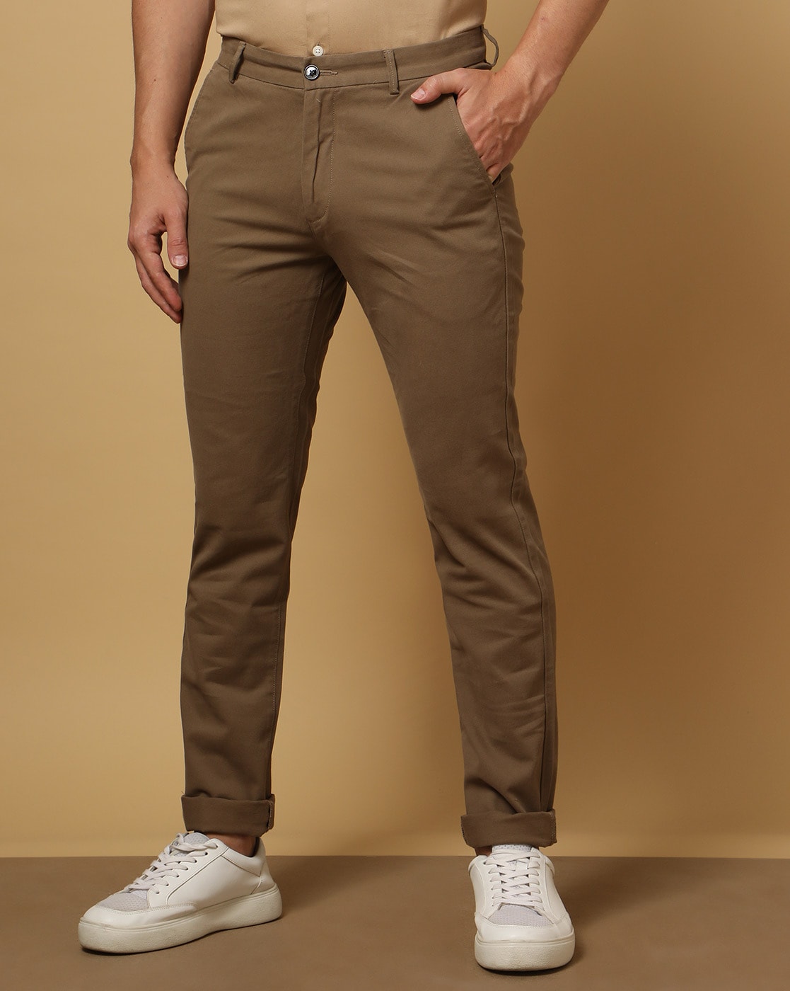 Arrow Sports Men Khaki Low Rise Bronson Slim Fit Solid Casual Trousers Buy  Arrow Sports Men Khaki Low Rise Bronson Slim Fit Solid Casual Trousers  Online at Best Price in India 