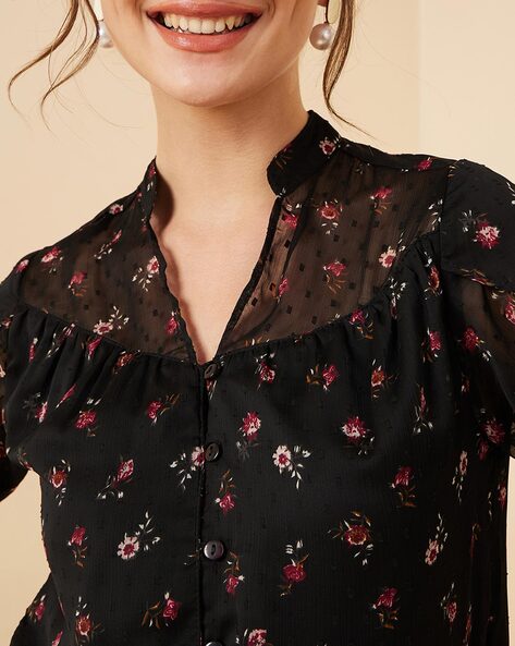 black blouse with red flowers