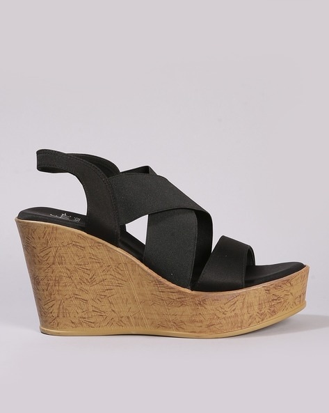 Black suede wedge discount heels