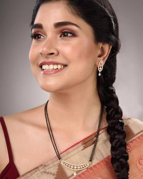 Saraf Rs Jewellery American Diamond-Studded Mangalsutra with Earrings