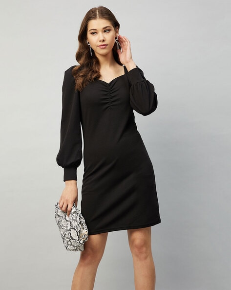 Bayan Long Sleeve Open Back Mini Dress in Black | Oh Polly