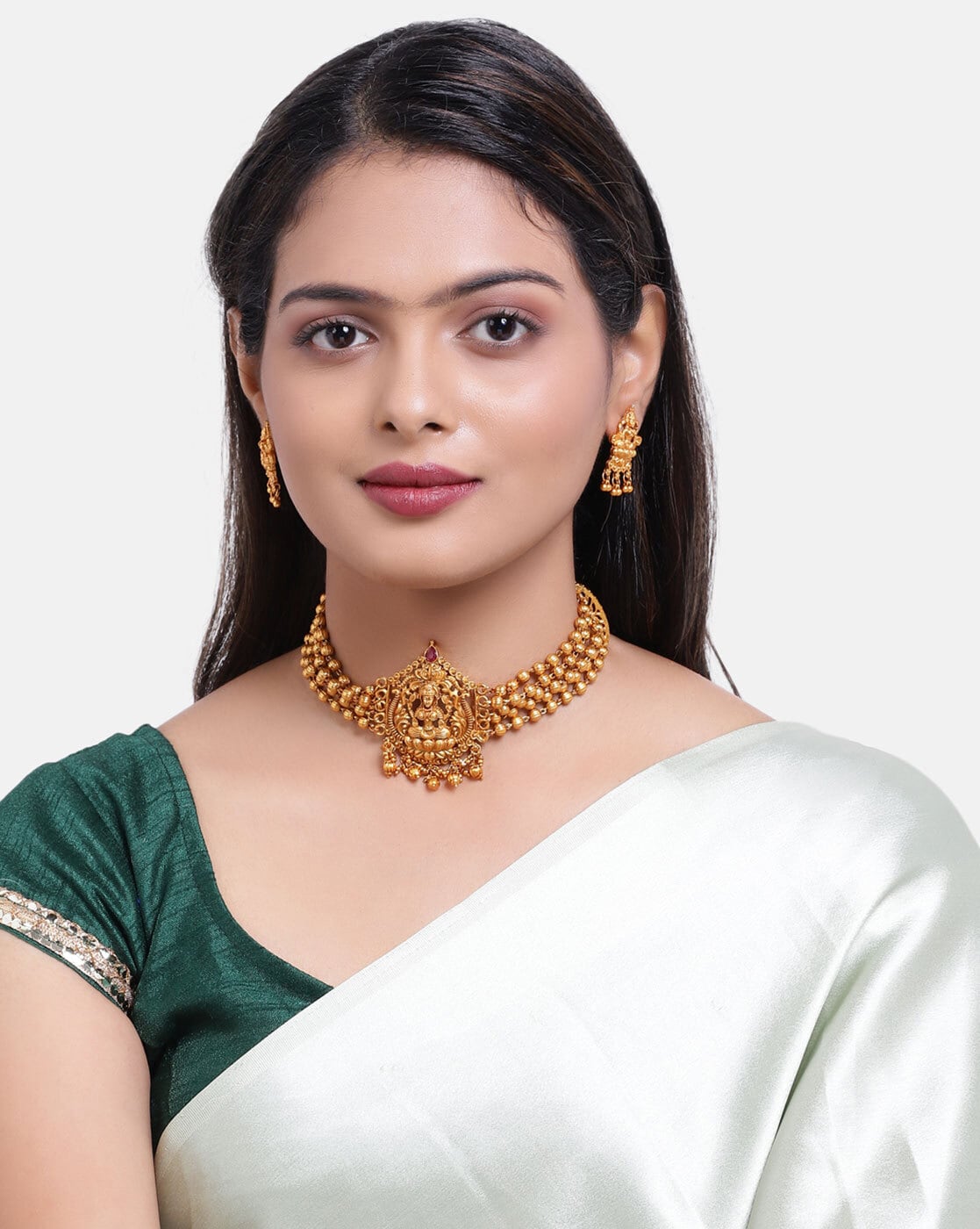 Girl wearing gold on sale jewellery