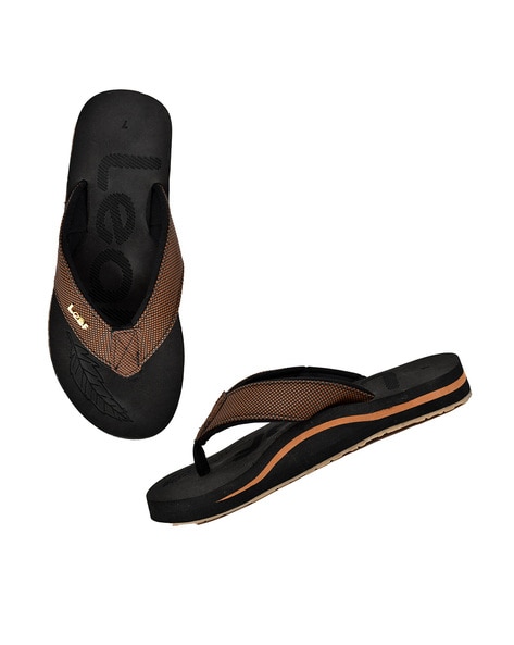 Reef black best sale flip flops womens