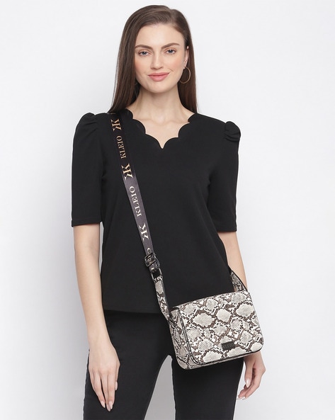 Boxy best sale sling bag