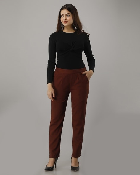Leather-effect trousers with belt - Women | Mango USA