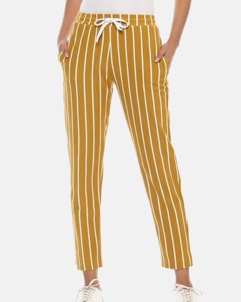 Buy Yellow Track Pants for Women by Campus Sutra Online - Main Image