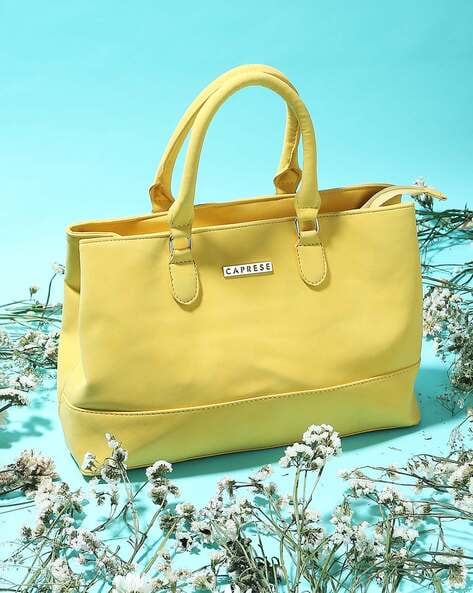 Buy Caprese Women Yellow Hand-held Bag Soft Yellow Online @ Best Price in  India | Flipkart.com