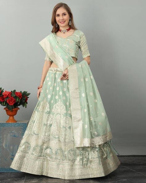 Designer Taffeta Silk Green Lehenga Choli at Rs.1450/Piece in surat offer  by Jeenal Fashion