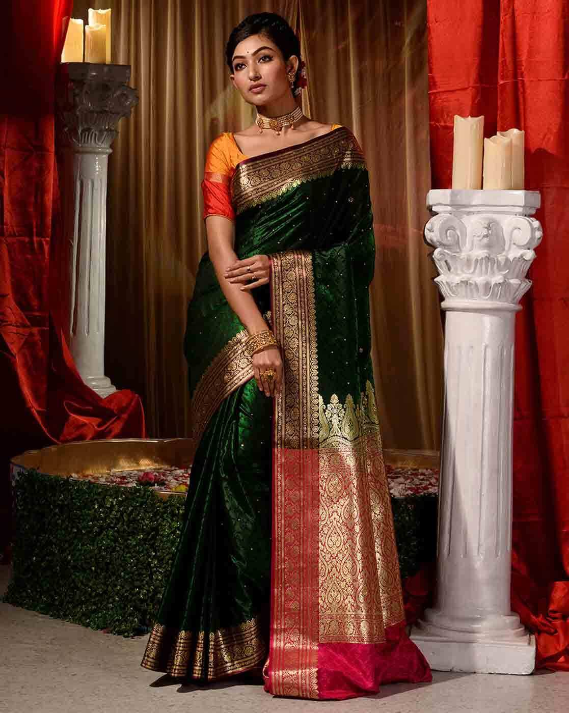 Sea Green Embroidered Border Georgette Saree at best price in Delhi