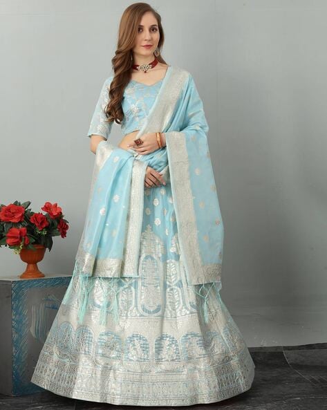 Beautiful Silk printed Lehenga-Choli. Embellished with organza dupatta with  ruffles. Simple an… | Party wear indian dresses, Indian fashion dresses,  Lehnga designs