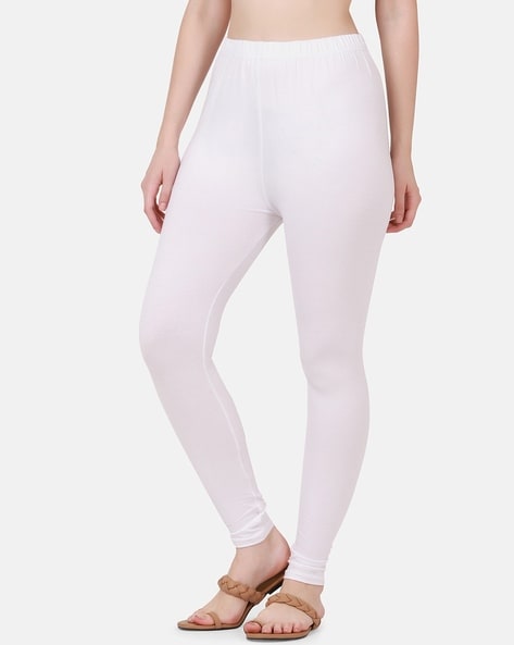 Buy White Leggings for Women by BUYNEWTREND Online