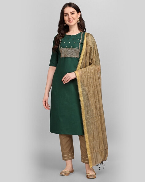 What color pants do I wear with a cream color kurti to enhance my look? -  Quora