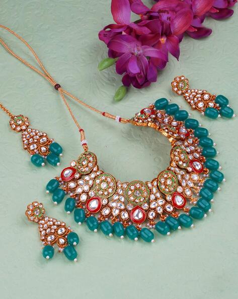 Red and green on sale kundan necklace set