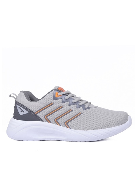 Sport shoes price shop list in india