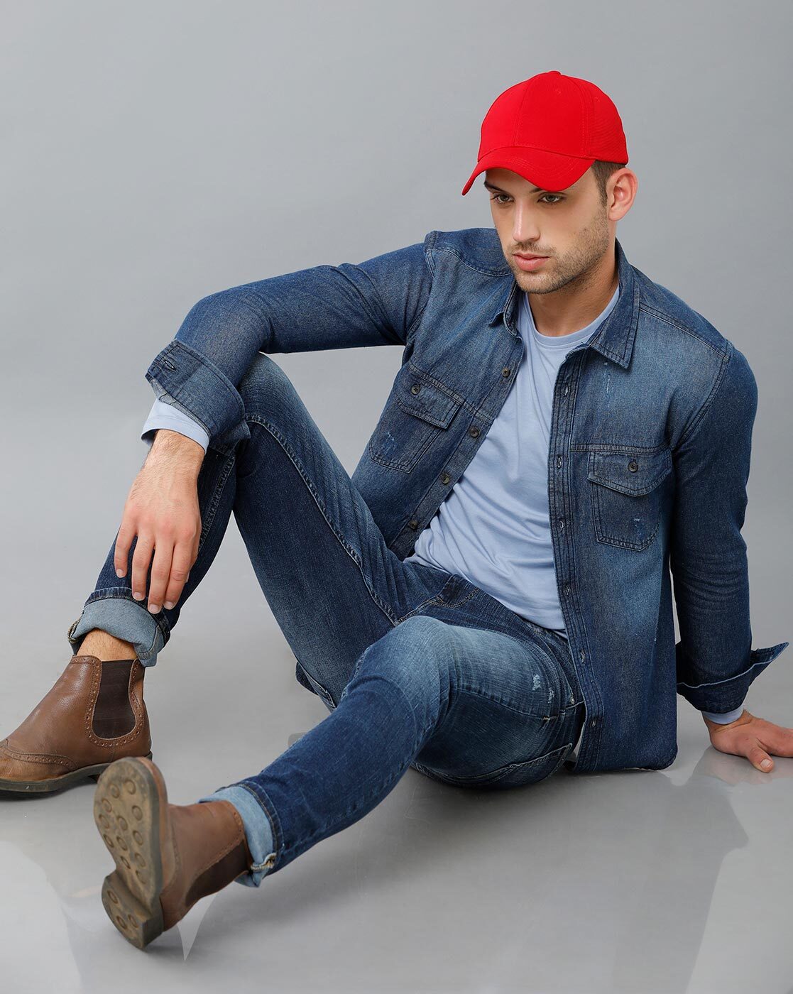 In love with denim. Man bearded hipster fashion model wear denim clothes  urban background stairs. Regular walk in city center. Confident guy wear  jeans denim trousers and shirt. Comfortable outfit Stock Photo -