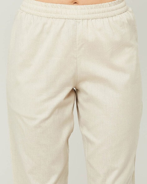 Side elastic squared trousers - Beige