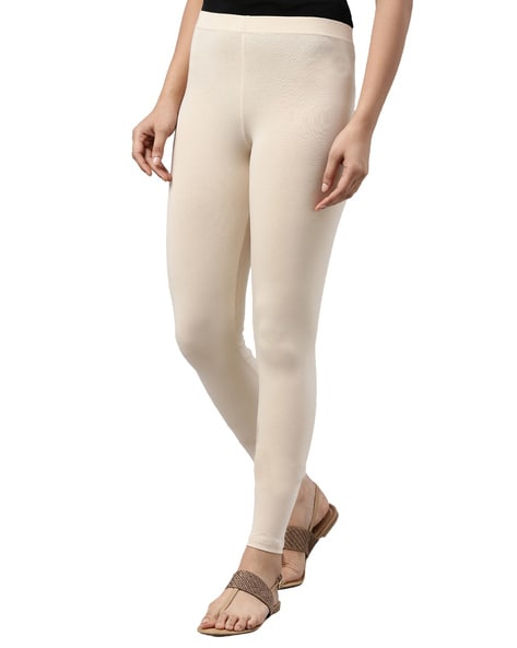 Buy Go Colors Women Cream Solid Stretch Leggings Online at Best