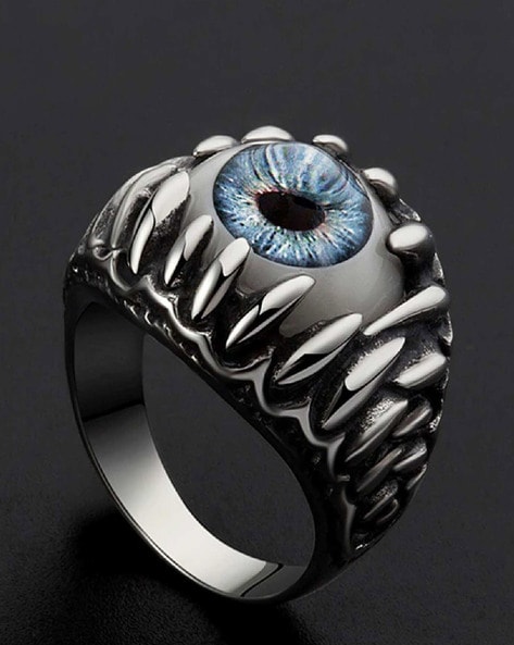 This striking men's ring features a domic tiger eye stone in an ellipse  shape with a braid pattern on its sides. For a unique style, get this  stylish silver ring now! –