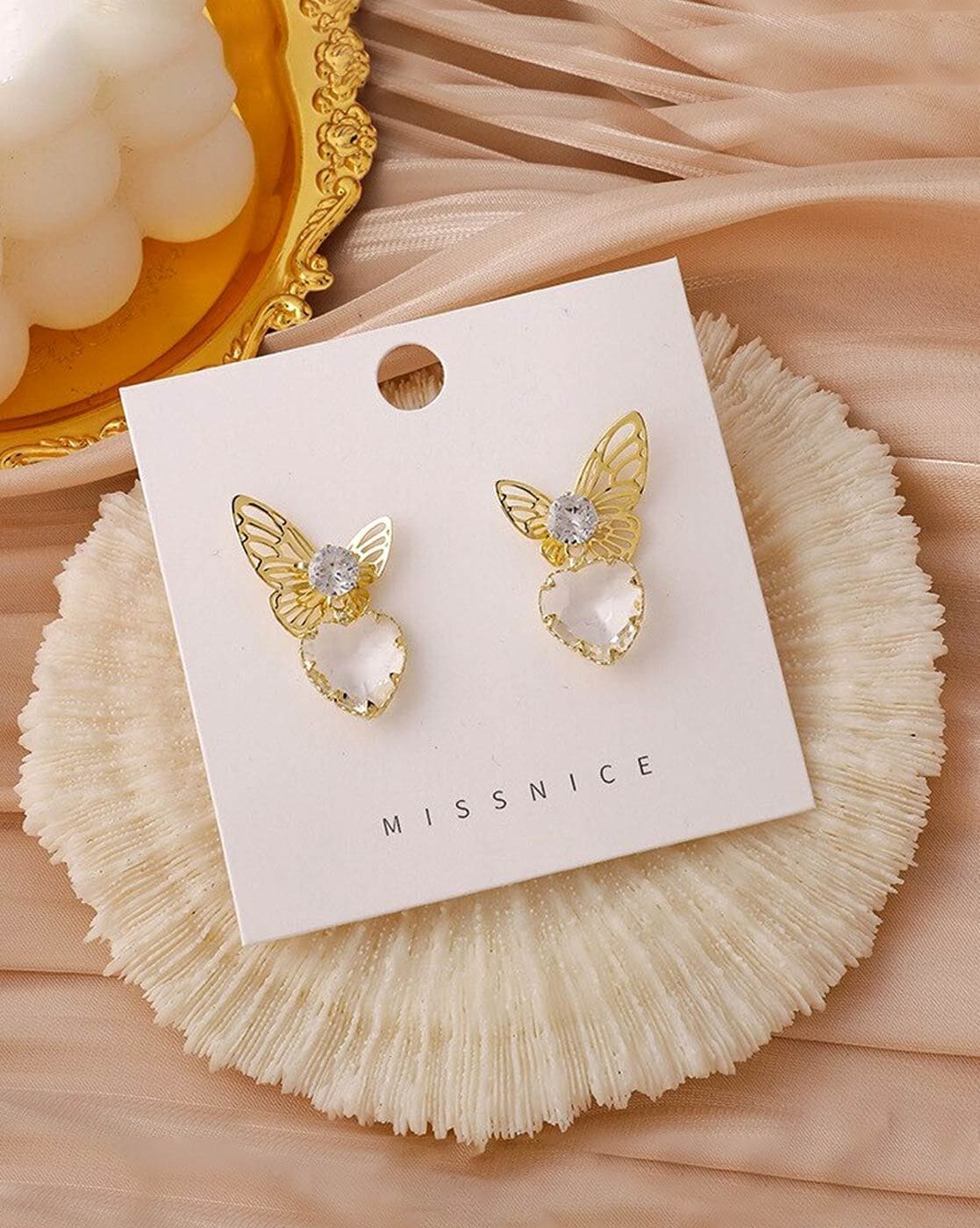 Trendy gold stud deals earrings