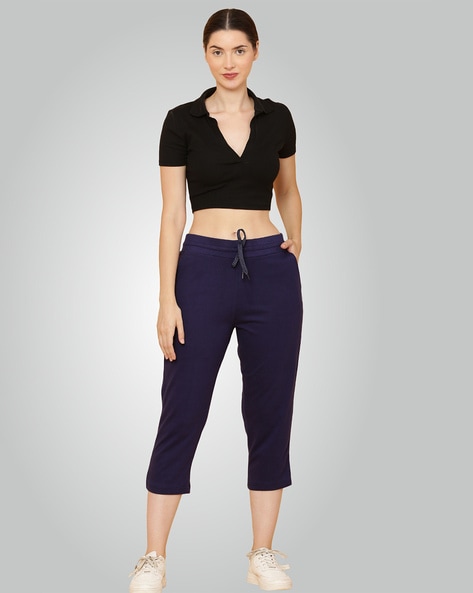 Lieve Van Gorp black capri trousers with open zipped sides and leather ties  - V A N II T A S