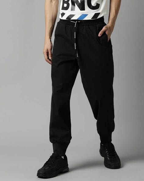 Buy Black Trousers & Pants for Men by BREAKBOUNCE Online